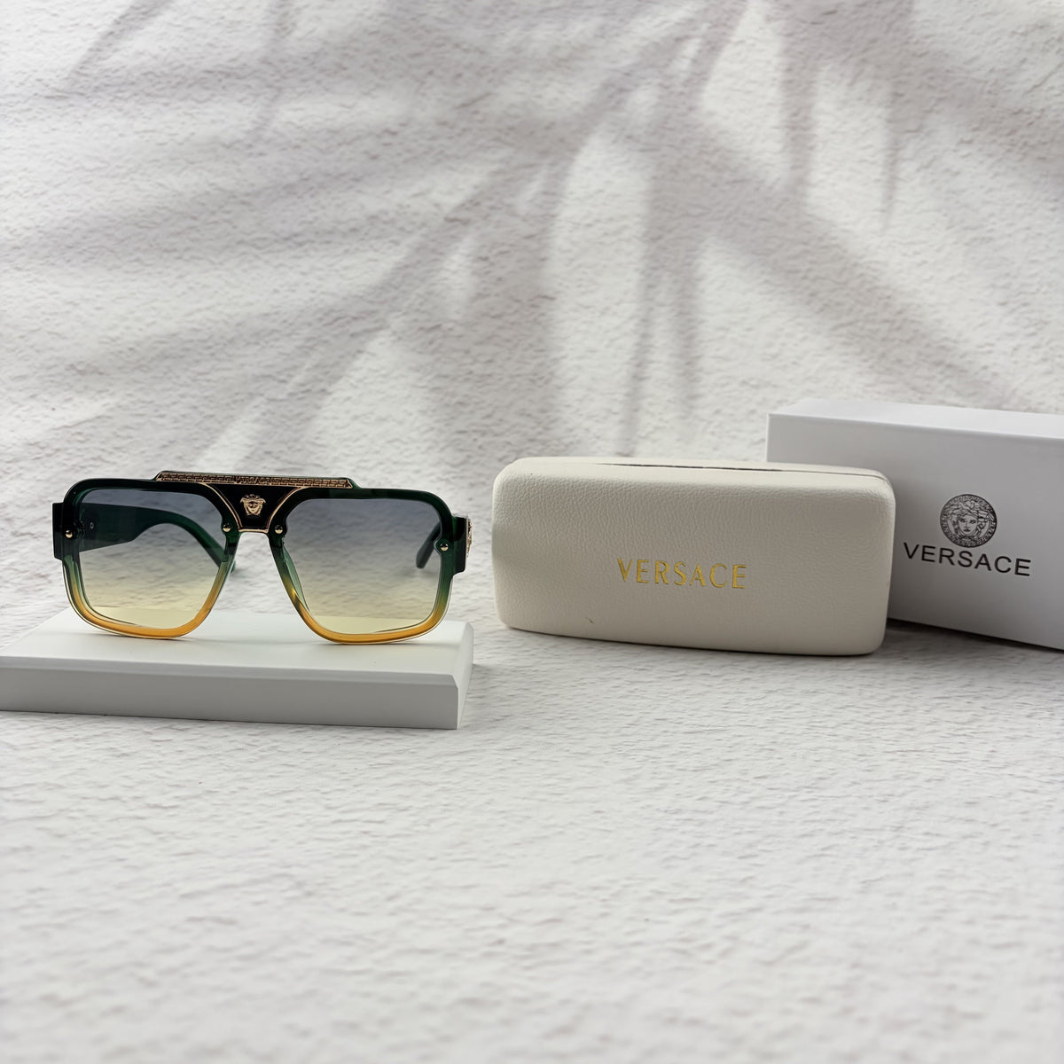Geometric Gradient Sunglasses with Gold Accents for UV Protection